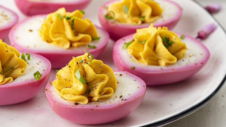 Bright pink beetroot deviled eggs