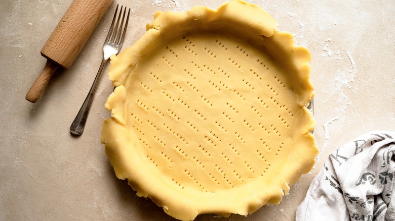 pie crust dough in pie tin