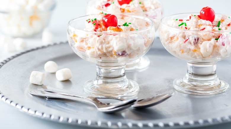 ambrosia salad in glasses with spoons