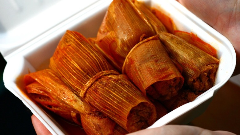 Hot tamales in a styrofoam to-go container