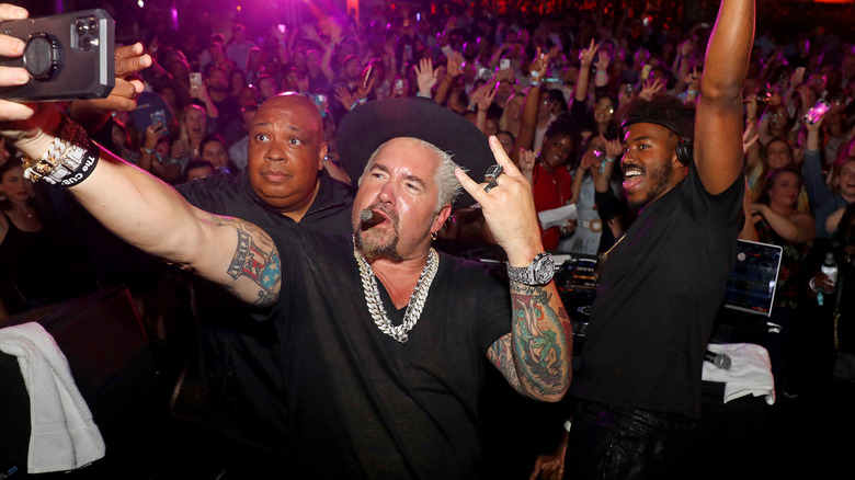 Guy Fieri taking a selfie