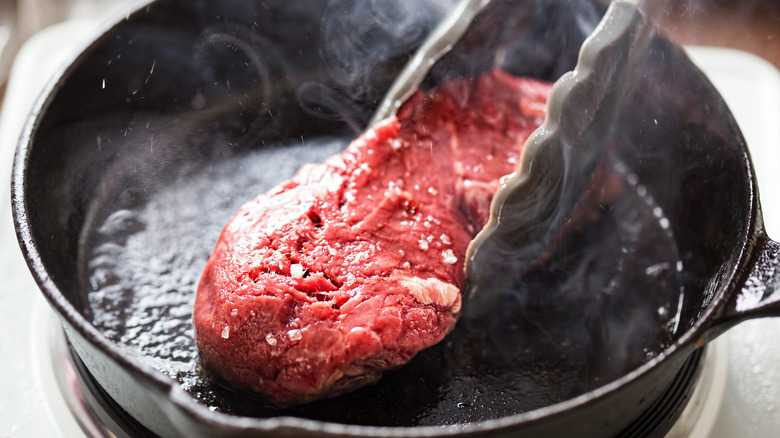 Searing meat in cast-iron pan