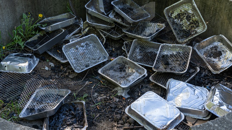 Trash pile of disposable grills