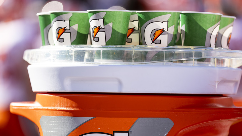 Gatorade in cups on football sideline