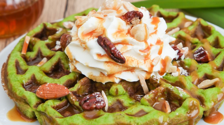 pandan waffle with whipped cream and toppings