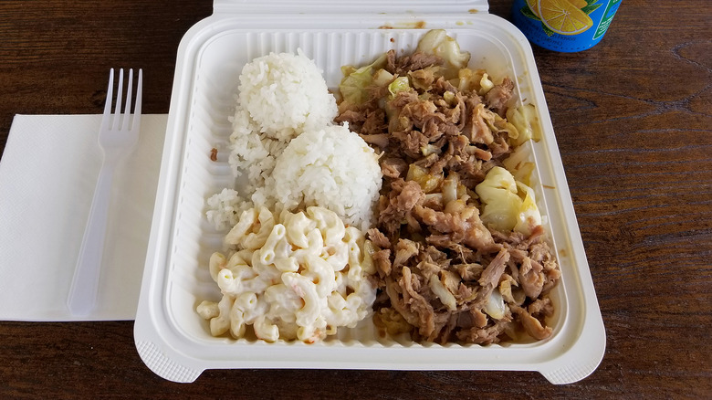 A Hawaiian plate lunch with kalua pork, rice, and macaroni salad