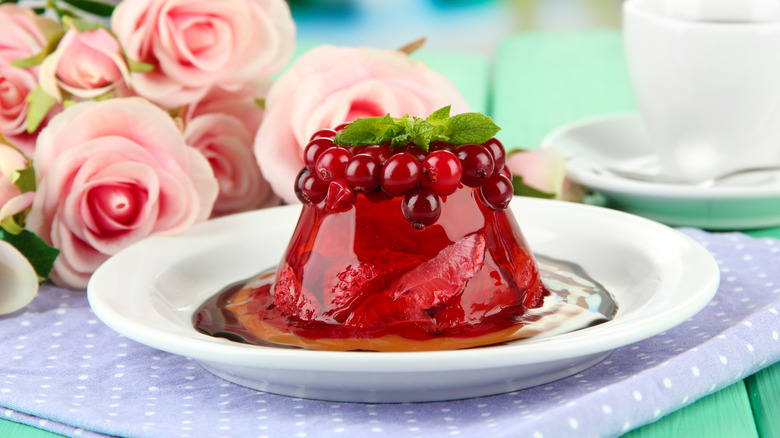 Red Jell-O mold with cherries and strawberries