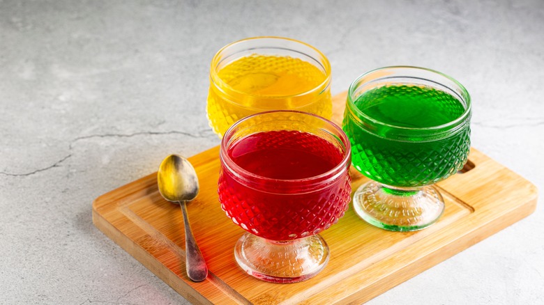 Three colors of gelatin in glass bowls