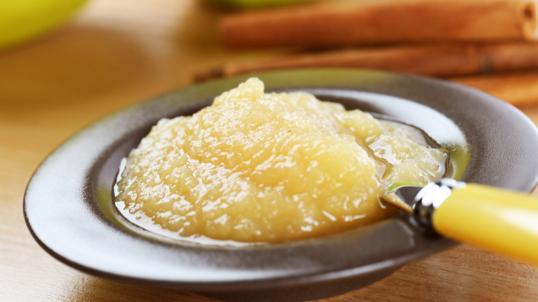 Bowl of applesauce with spoon