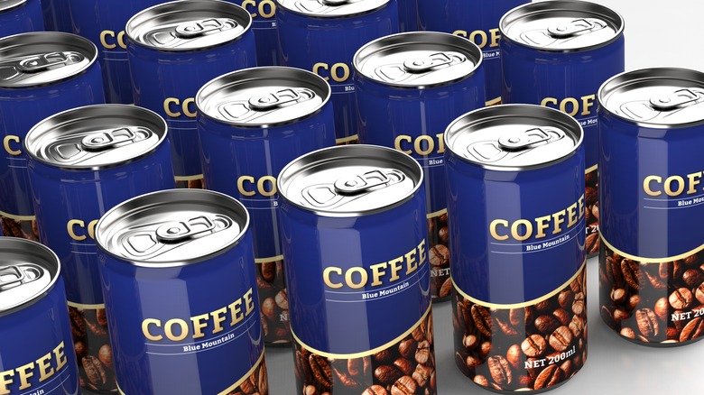 Cans of coffee against a white background