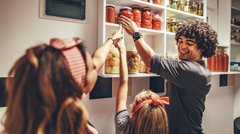 Taking jar from home pantry