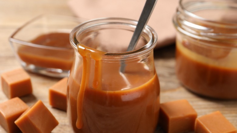 butterscotch sauce poured into a jar