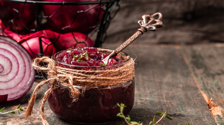 onion jam in jar with metal knife