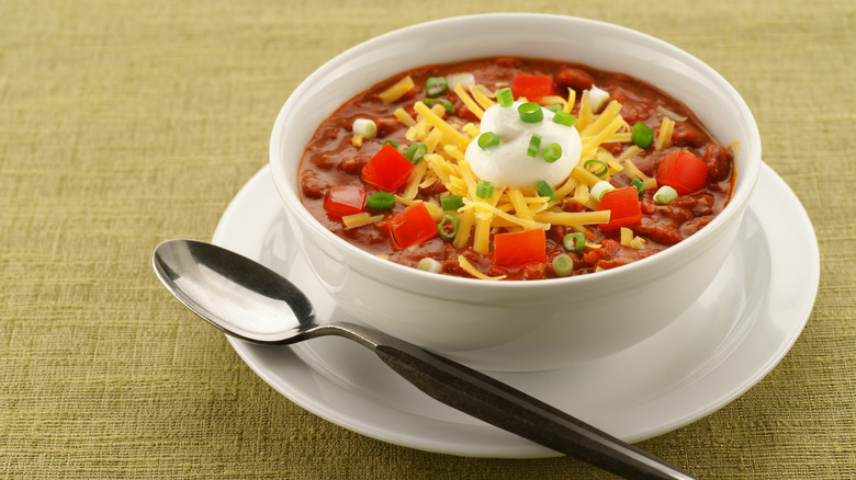 Sour cream served on chili