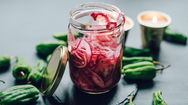 jar of pickled red onions with peppers