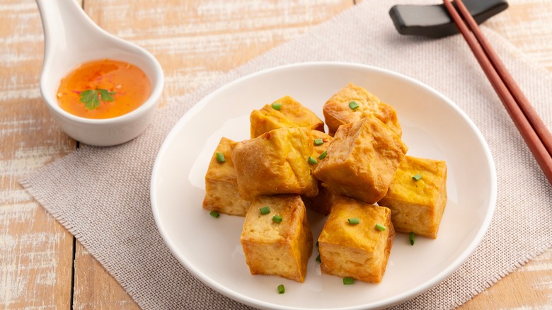 Plated fried blocks of tofu