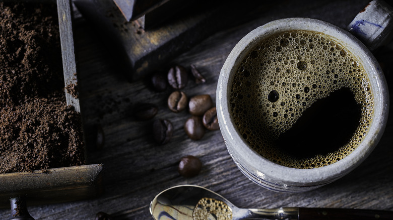 Cup of coffee with grounds