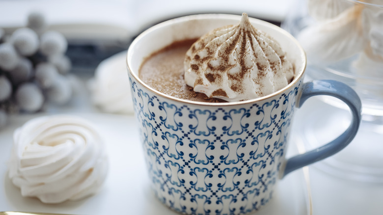 Mug of cocoa with whipped cream