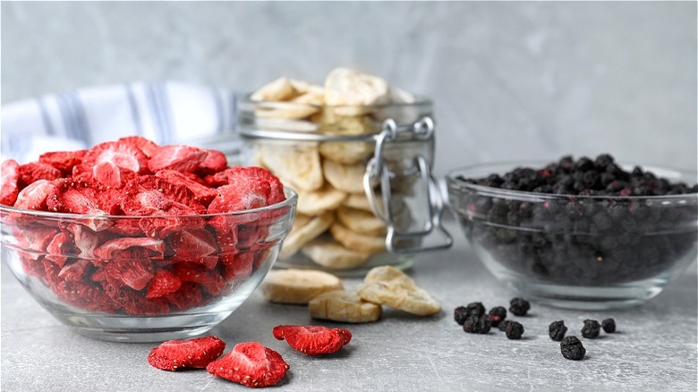 Clear containers of freeze-dried fruit