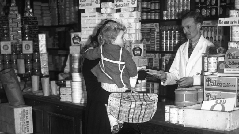 1940s woman shopping with child