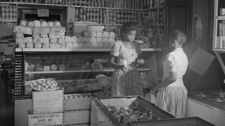 two young women grocery shopping