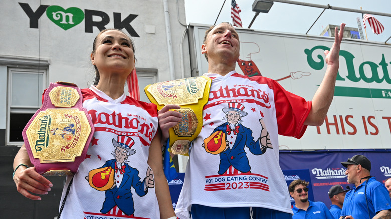 Miki Sudo and Joey Chestnut after winning