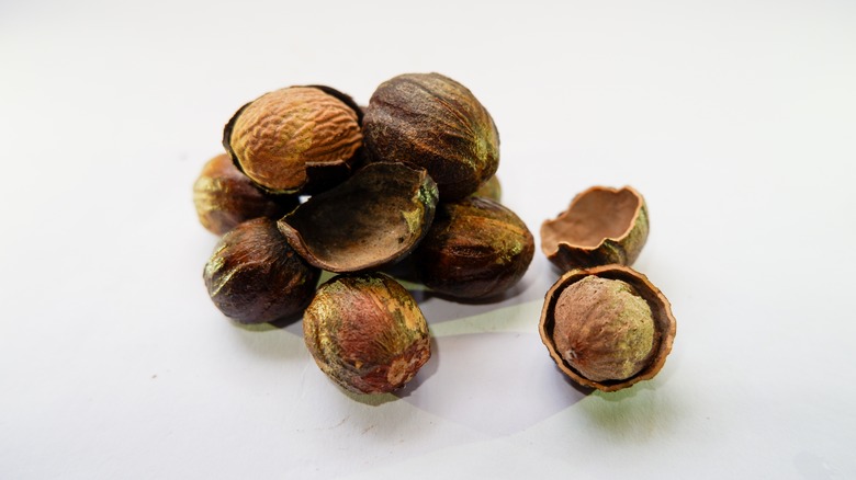 cracked nutmeg pods