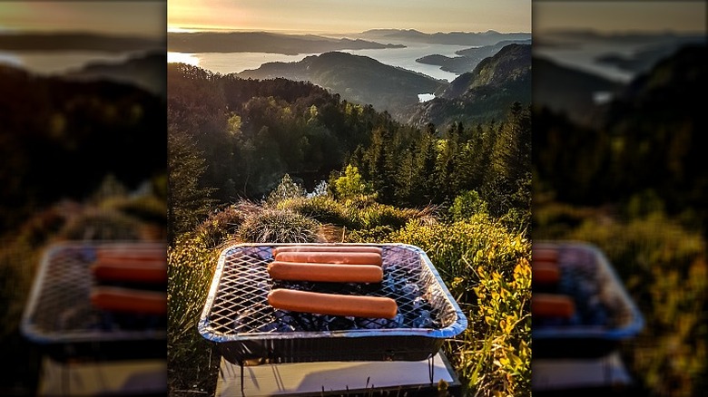 Grilling sausages outdoors