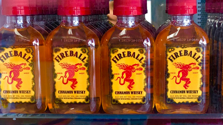 mini bottles of Fireball shots on a shelf