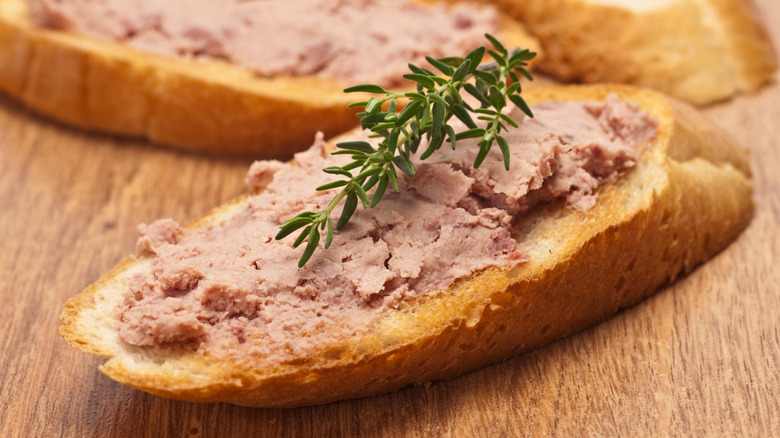 Pate smeared on a piece of bread