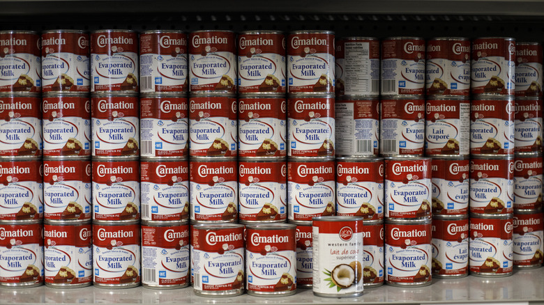 stacked cans of evaporated milk