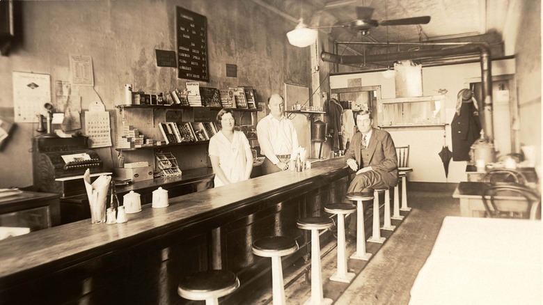 Patrons at soda fountain