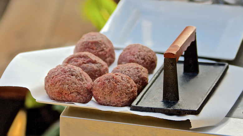 ground beef with grill press