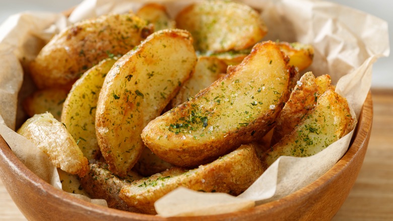 crispy potato wedges in bowl