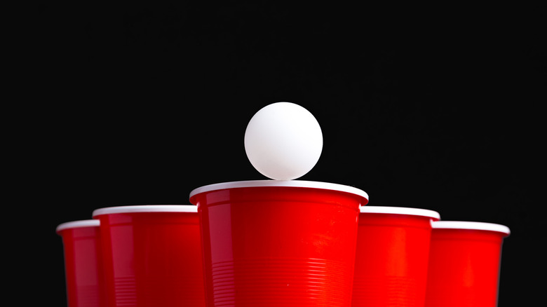 beer pong ball and cups