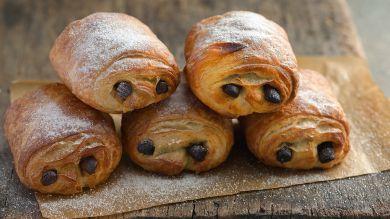 Chocolate croissants sprinkled with powdered sugar