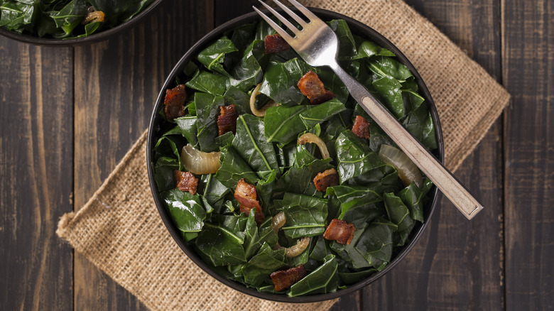 Bowl of collard greens with bacon