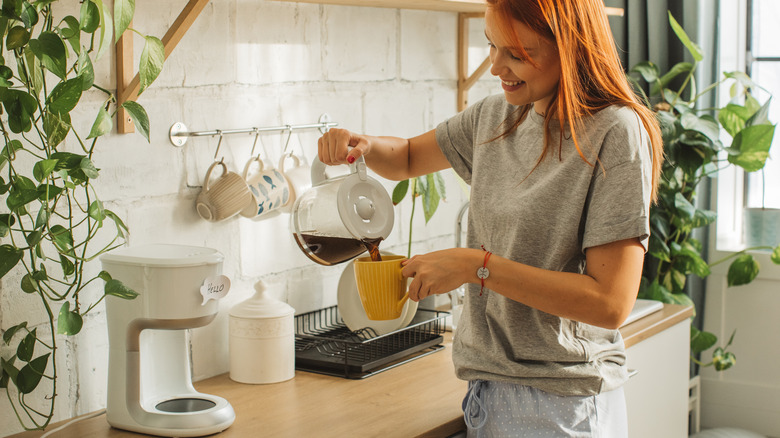 Woman pouring coffee