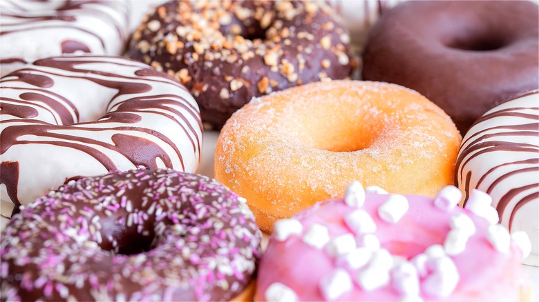 Donuts with sugar, frosting, and sprinkles 