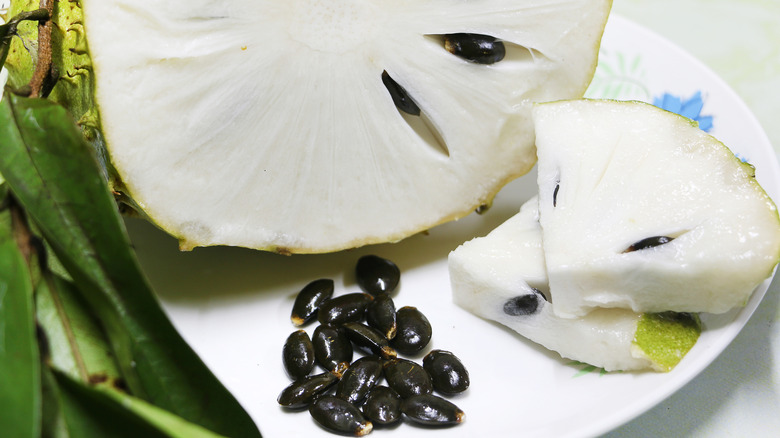 sliced soursop on a plate