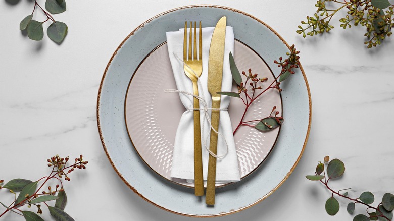 Place setting with napkin