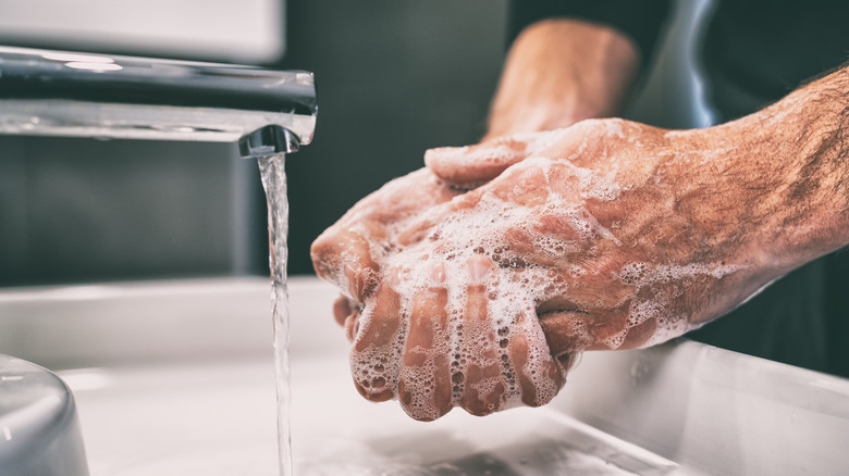 Man washing hands