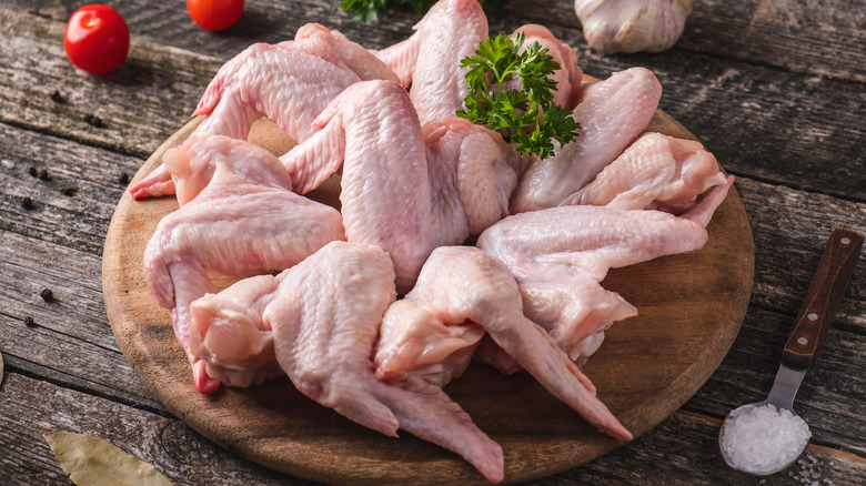 Plate of raw chicken wings