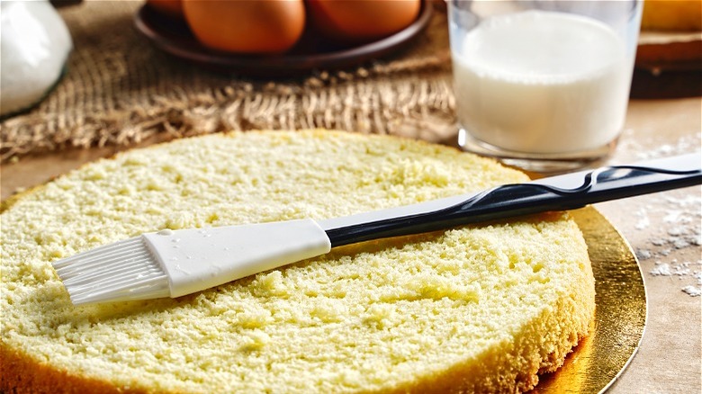 Cake with pastry brush and milk 