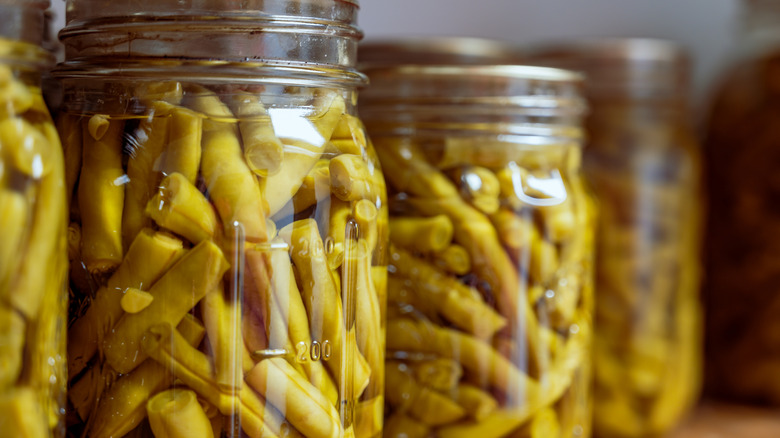 cooked green beans in glass jar