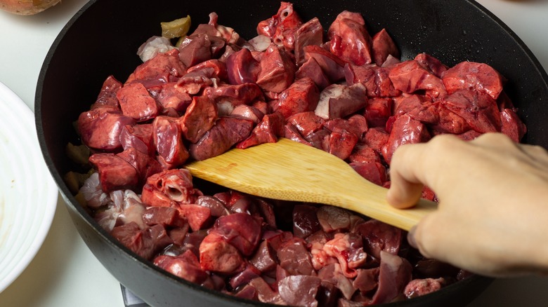 cooking offal meat in pan