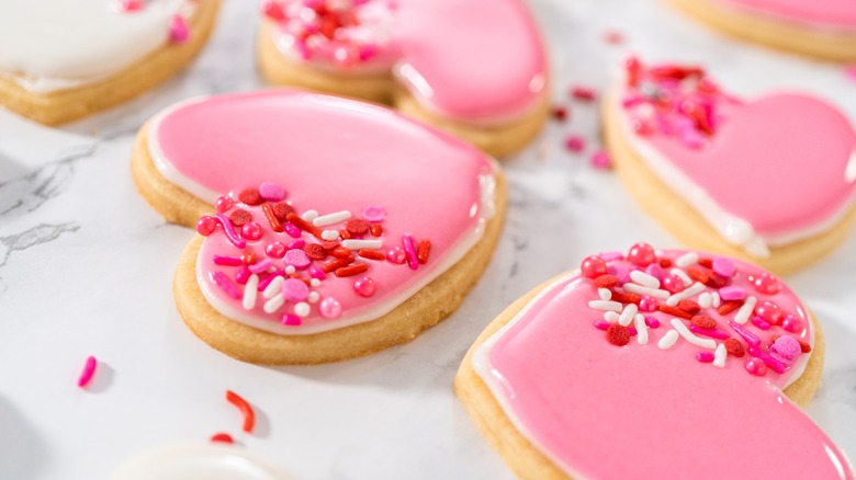 shiny iced heart-shaped cookies