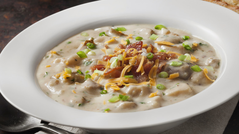 Loaded baked potato soup topped with cheddar and bacon