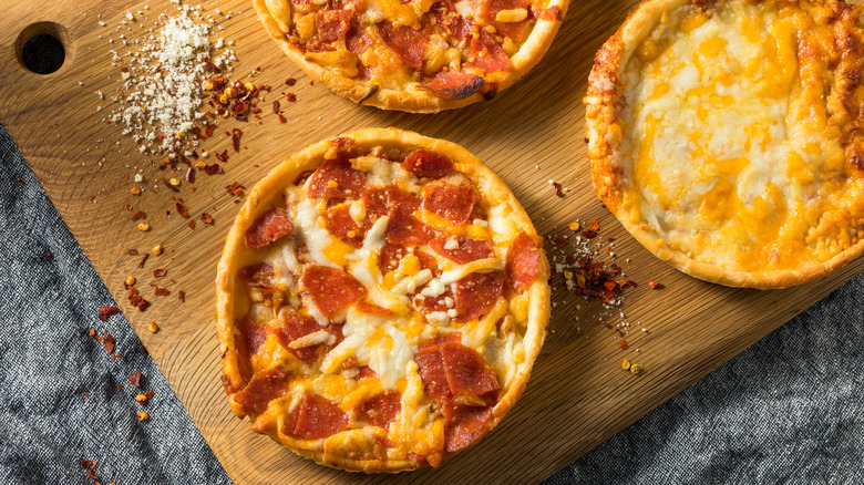 Pizzas on a cutting board