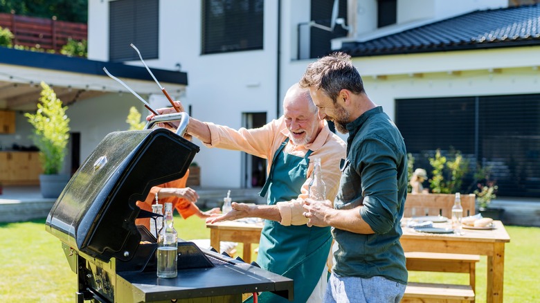 two people grilling